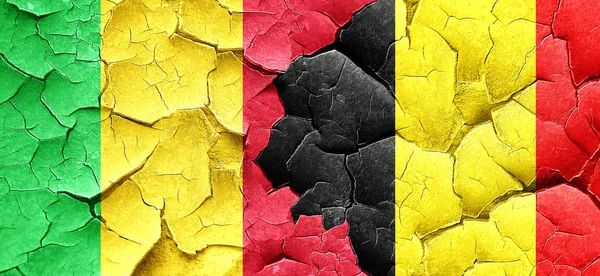 Mali flag with Belgium flag on a grunge cracked wall — Stock Photo, Image