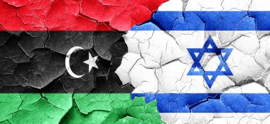 Libya bayrağı bir grunge İsrail bayrağı ile duvar kırık