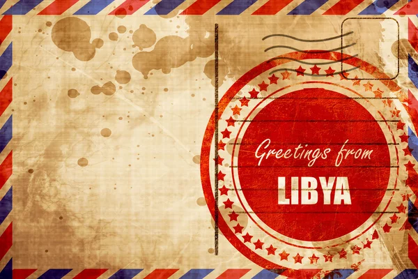 リビア、航空便の背景に赤のグランジ スタンプからのご挨拶 — ストック写真