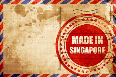 Made in singapore, red grunge stamp on an airmail background clipart