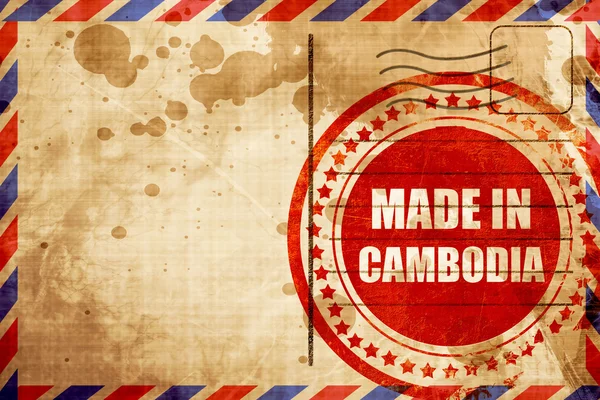 Feito em cambodia, selo grunge vermelho em um fundo de correio aéreo — Fotografia de Stock