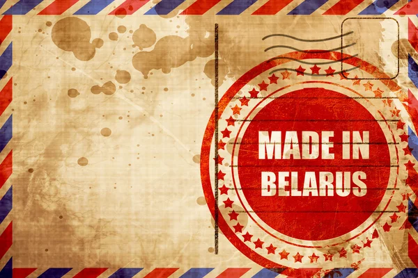 Κατασκευασμένο στη Λευκορωσία, κόκκινη γκραντζ σφραγίδα σε αεροπορικό φόντο — Φωτογραφία Αρχείου