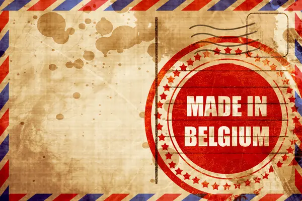 Gemaakt in België, rode grunge stempel op een luchtpost achtergrond — Stockfoto