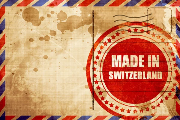瑞士制造，航空邮件背景上的红色格龙章 — 图库照片