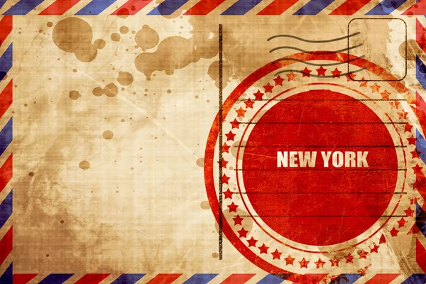 New York, selo grunge vermelho em um fundo de correio aéreo — Fotografia de Stock