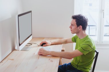 man in front of computer clipart