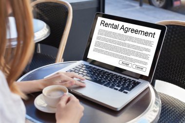 woman reading tenancy contract clipart