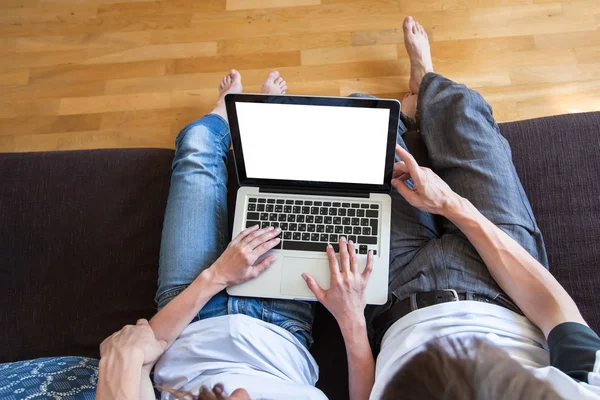 Young couple using internet — Stock Photo, Image