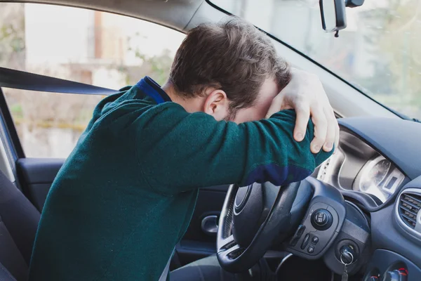 Tired driver in the car — Stock Photo, Image