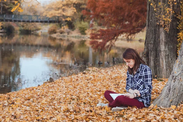 Young woman with book — Stock Photo, Image