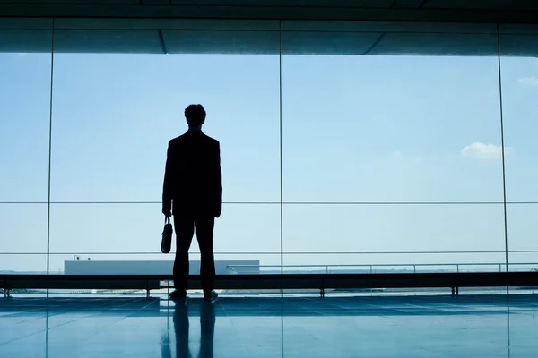 Silhouette of businessman waiting — Stock Photo, Image