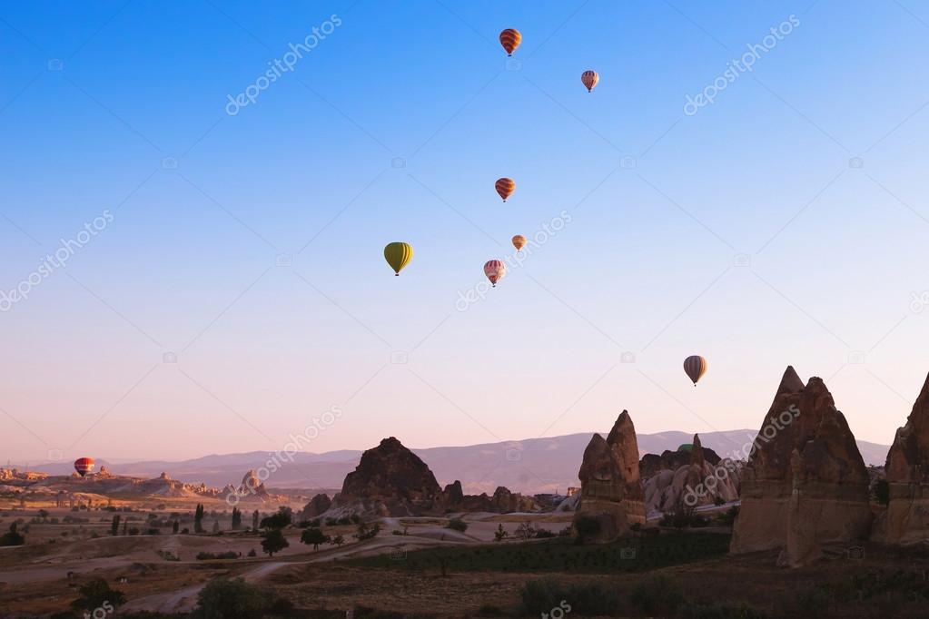 Air balloons over mountains