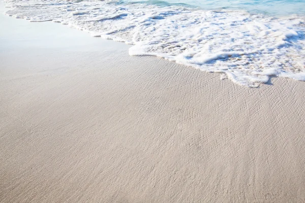 Fondo con arena en la playa — Foto de Stock