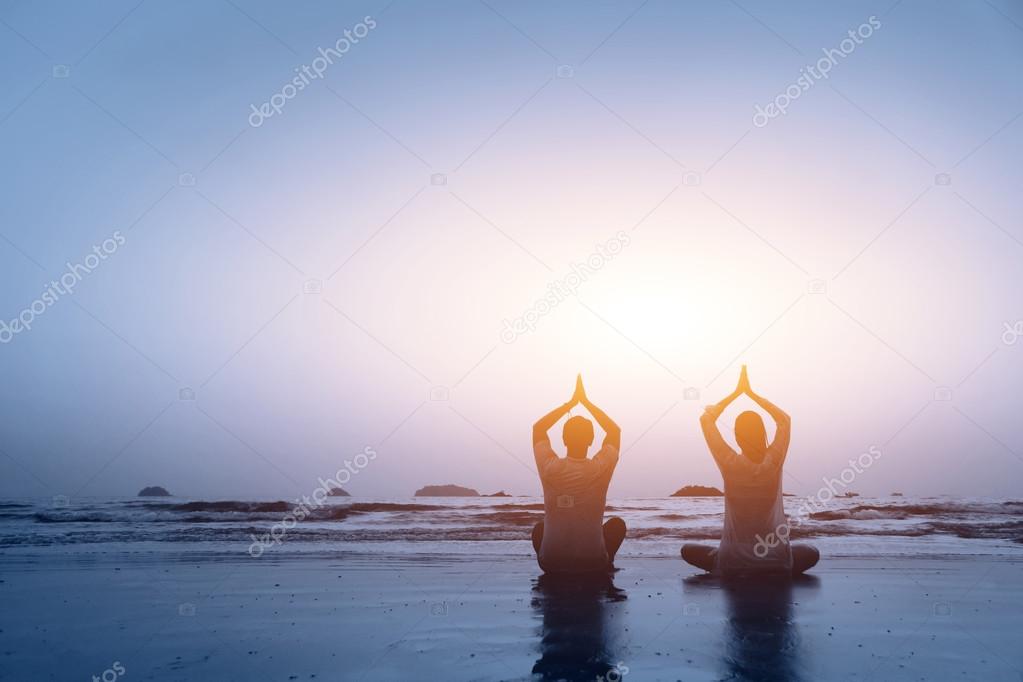 Couple practicing yoga