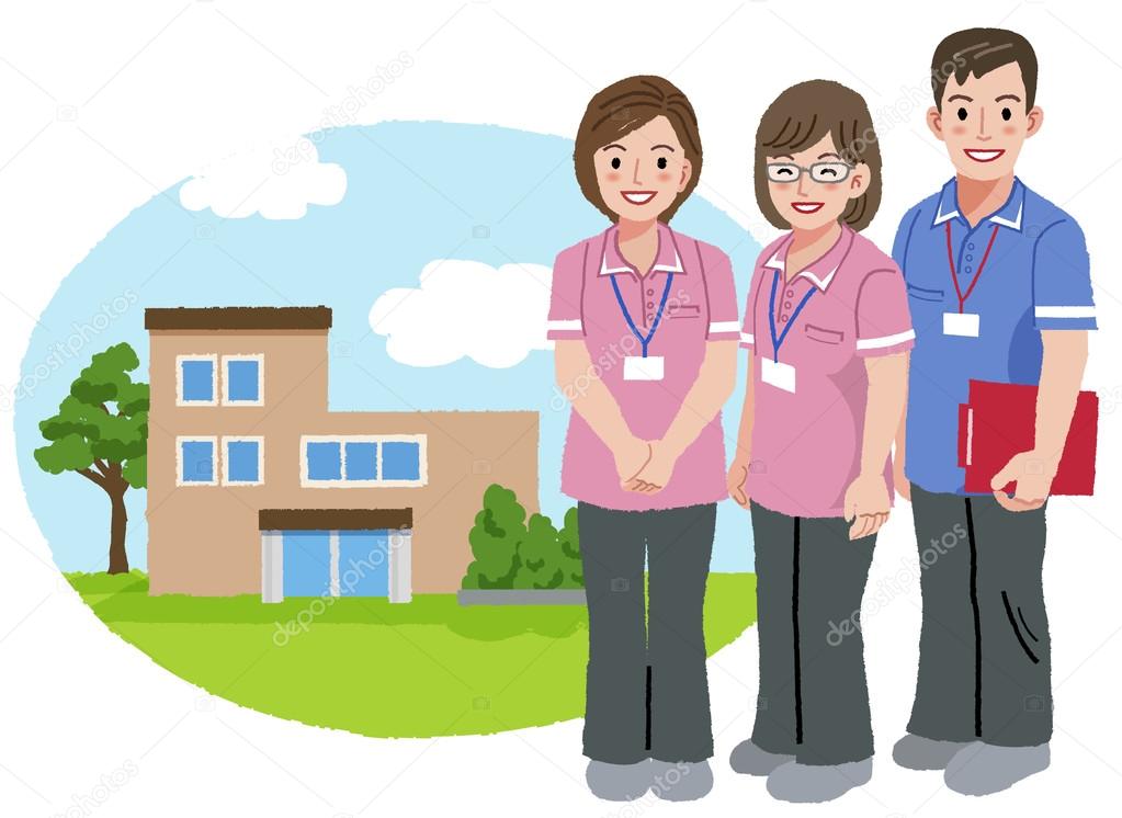 Smiling caregivers with nursing house background