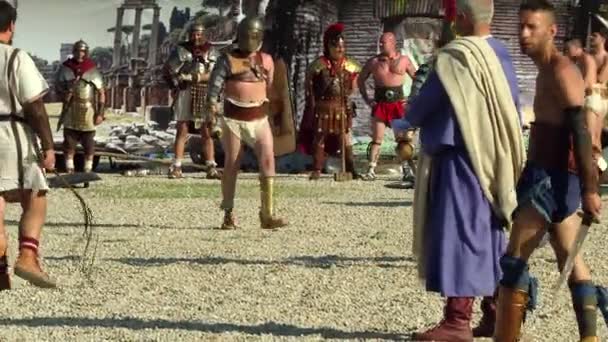 Roman gladiators fighting during Birth of Rome celebration — стокове відео