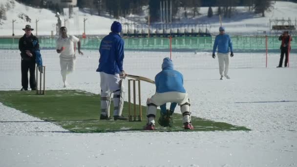 Cricket on ice delivery slow motion — Stock Video