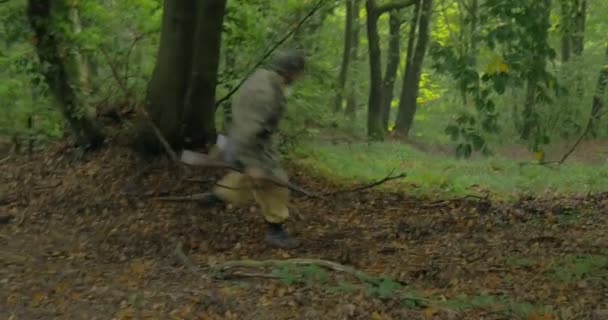 A patrol of German soldiers during a WWII reenactment — Stock Video