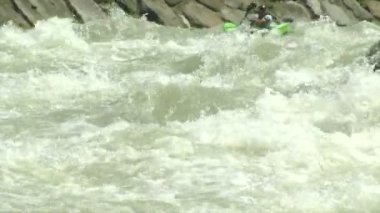 wildwater canoeing man slow motion
