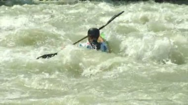 wildwater canoeing man slow motion