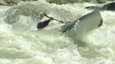 wildwater canoeing man slow motion