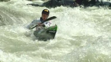 wildwater canoeing man slow motion