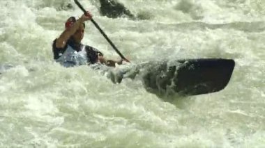 wildwater canoeing man slow motion
