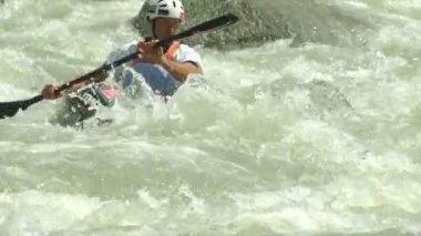 wildwater canoeing man slow motion