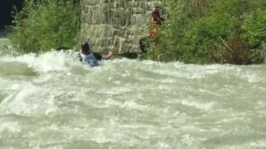 wildwater canoeing man slow motion