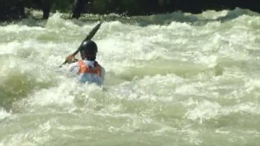 wildwater canoeing man slow motion