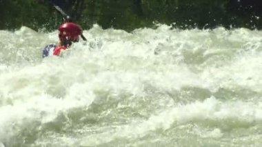 wildwater canoeing man slow motion