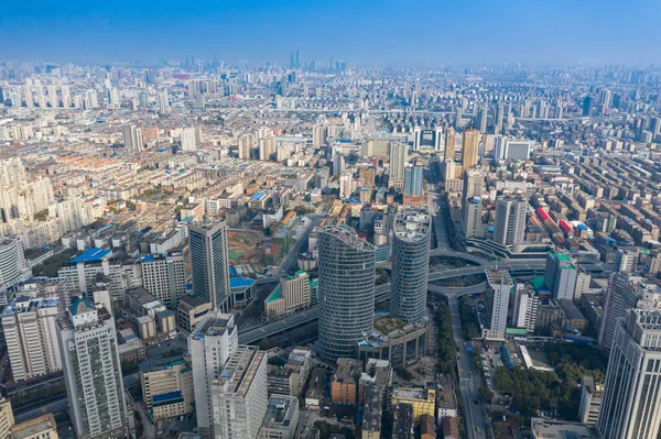 elevated view of city architecture under blue sky