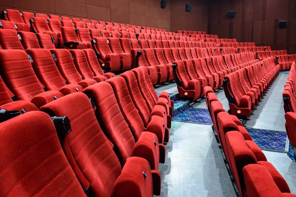 Empty movie theater with red seats — Stock Photo, Image