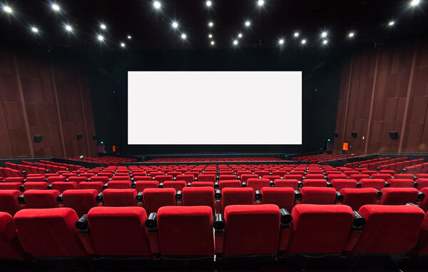 Empty movie theater with red seats