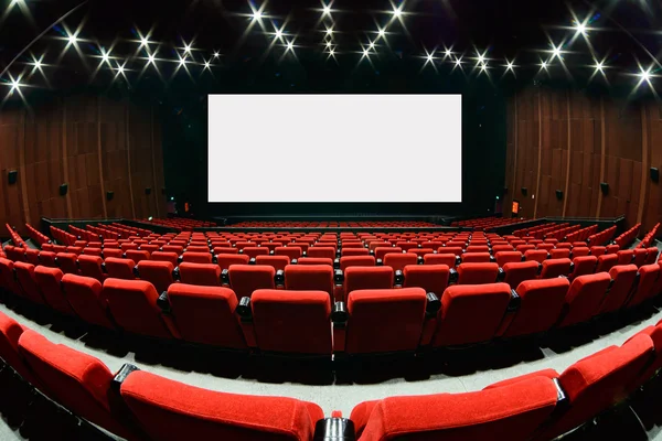 Empty movie theater with red seats