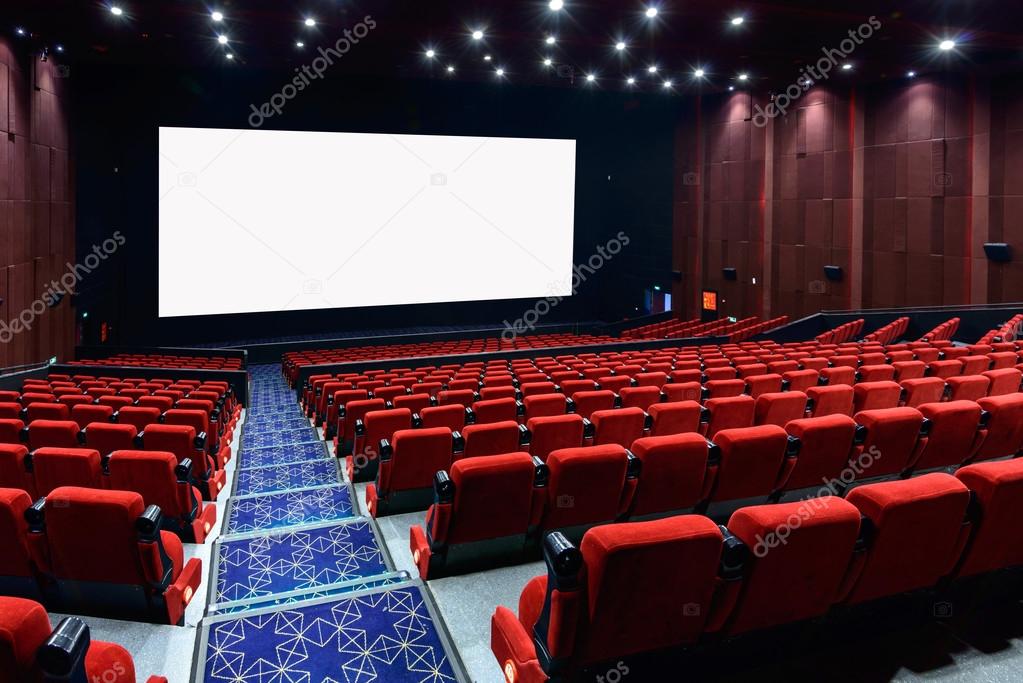 Empty movie theater with red seats