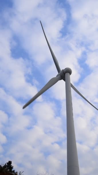 Wind turbines in the country side at evening — Stock Video