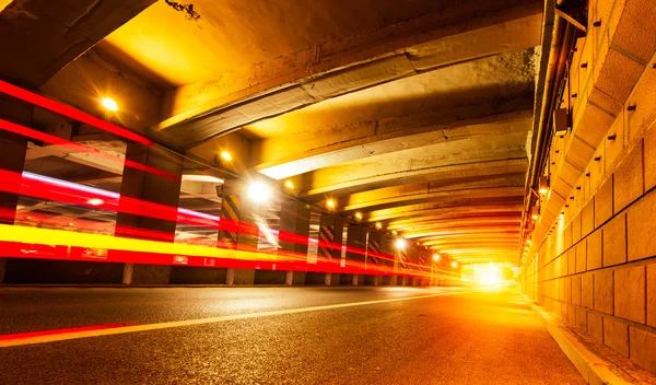 The light trails on the modern building background in shanghai china — Stock Photo, Image