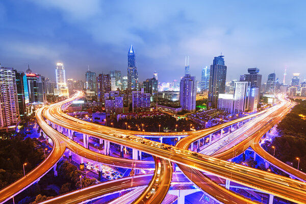 Shanghai elevated road junction and interchange overpass at night