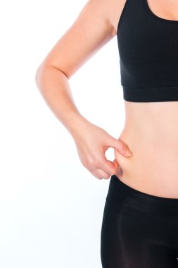 şişman kadın göbeği holding veya yağlı beyaz zemin üzerine pinching