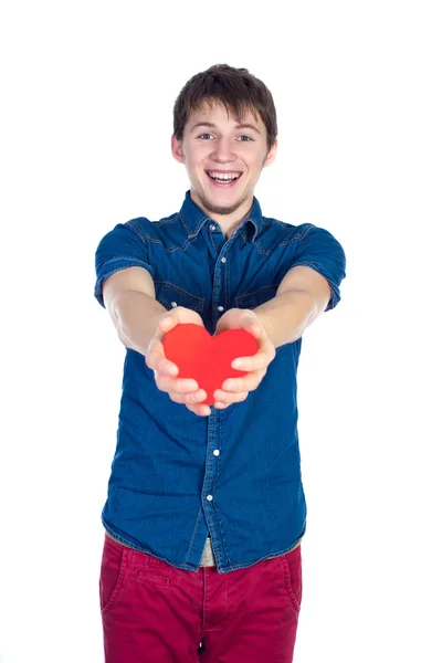 Handsome brunette mans holding a red heart, isolated on white background — Stock Photo, Image