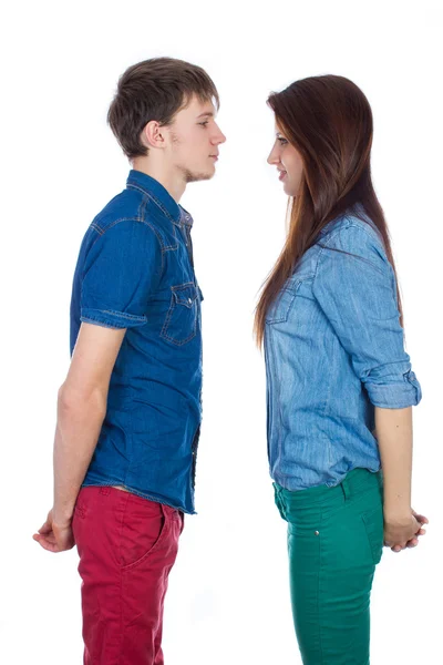 Beautiful and young loving couple, standing opposite each other — Stock Photo, Image