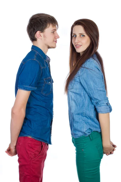 Beautiful and young loving couple, standing opposite each other — Stock Photo, Image