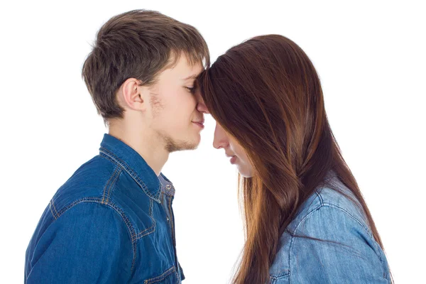 Beautiful and young loving couple, standing opposite each other — Stock Photo, Image