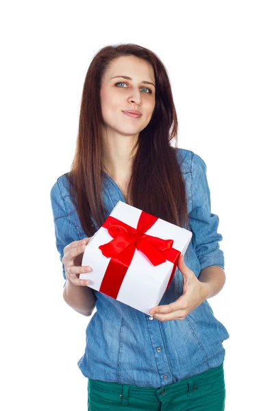 Beautiful brunette with long hair isolated on white background with gift box in hands — Stock Photo, Image