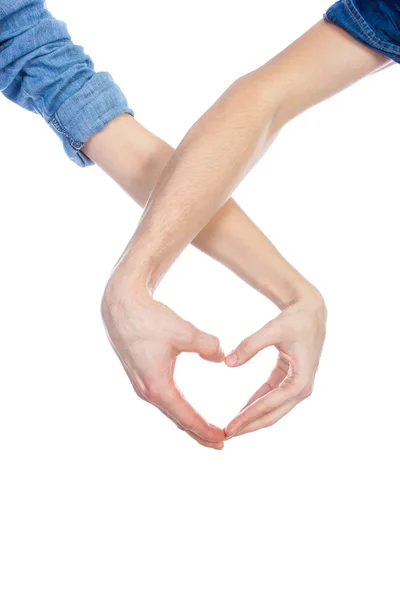 Valentijn paar in liefde hart tonen met hun vingers. Liefde Concept. Stockafbeelding