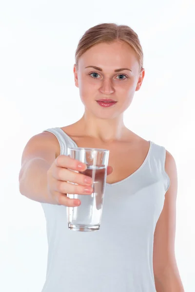 Young happy girl holding a glass of water — Stock Photo, Image