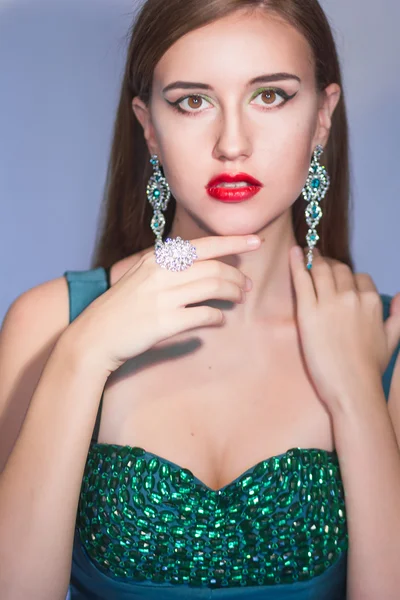 Elegant Posh Woman with Diamond Earrings