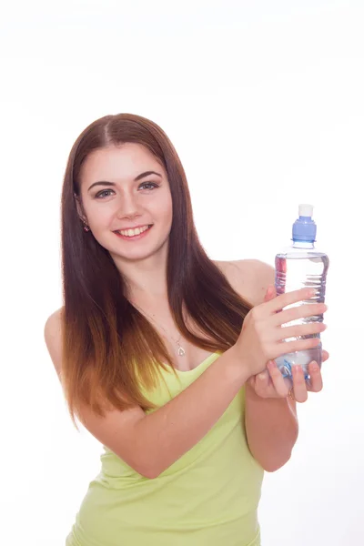 Žena fitness model drží láhev vody — Stock fotografie
