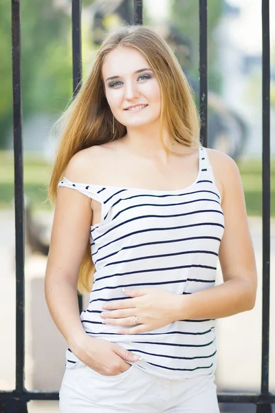 Stylish blonde smiling at camera — Stock Photo, Image